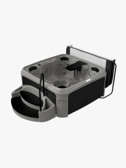 Rectangular above‑ground hot tub with built‑in jets, gray interior, black exterior, and an attached curved step system at the front.